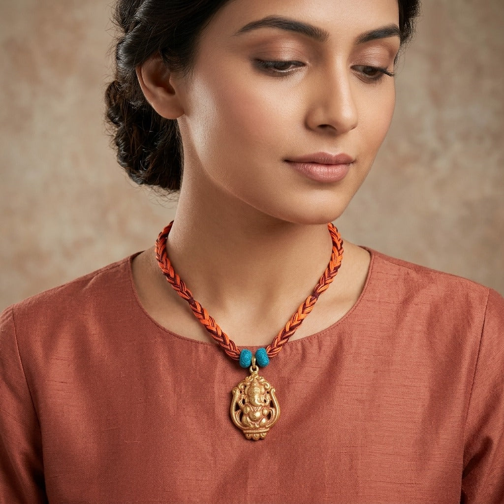 Costume Pendant (N64-04) with Ganesha design, worn by a model – Anjali Jewellers